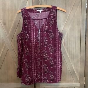 Maurices Top size L burgundy purple floral design. Sleeveless with zipper front